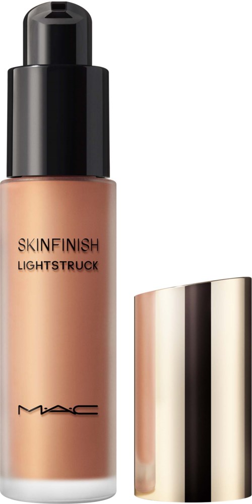 A foundation bottle from MAC with a black pump top and gold cap. Label says "Skinfinish Lightstruck."