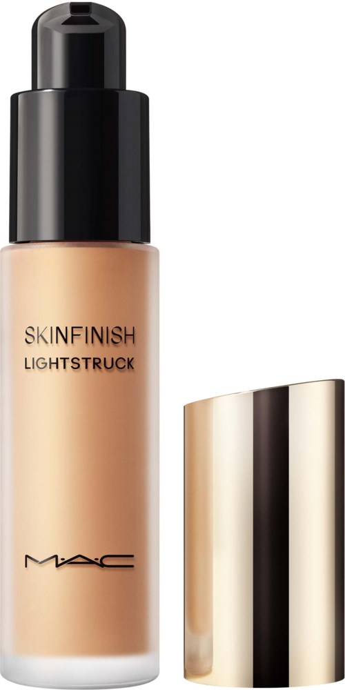Eine Flasche MAC Skinfinish Lightstruck Foundation mit goldener Kappe, schwarzer Pumpe und Produktname auf der Flasche.