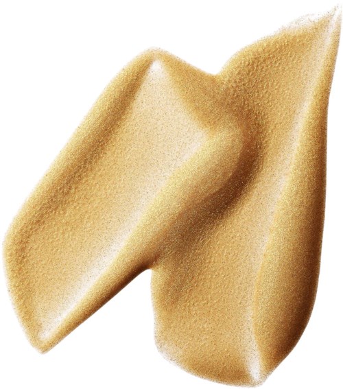 A dollop of beige-colored, creamy, smooth lotion or foundation on a white background.