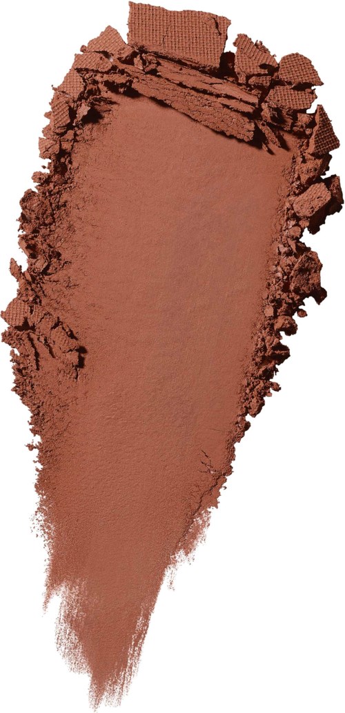 A brownish makeup or face powder crumbled with a rough, uneven edge and fine particles spreading outward.