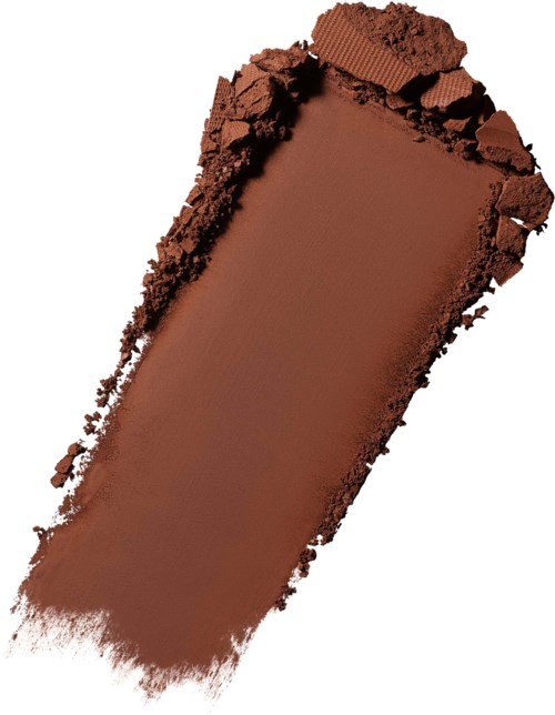 A broken piece of brown chocolate with some crumbs and smooth surface.