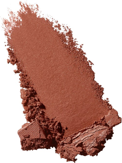 Ein Stück gepresstes, rötlich-braunes Pulver, wahrscheinlich Make-up oder Pigment, mit rauen Kanten und zerdrückten Bereichen.