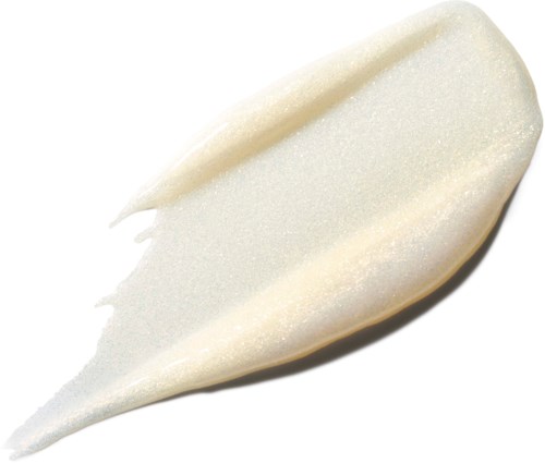 A white cream smear on a white background, smooth with a slight thickness and curved edges.