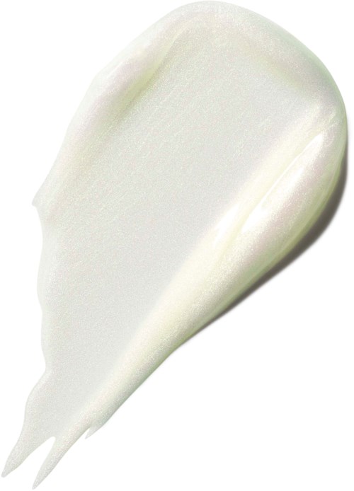 Cream or lotion smeared on a white surface, with a smooth, creamy texture.