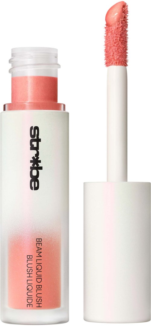 A white lip gloss tube with pink lip gloss and an applicator. The brand name is on the tube. The applicator is coated with pink gloss.