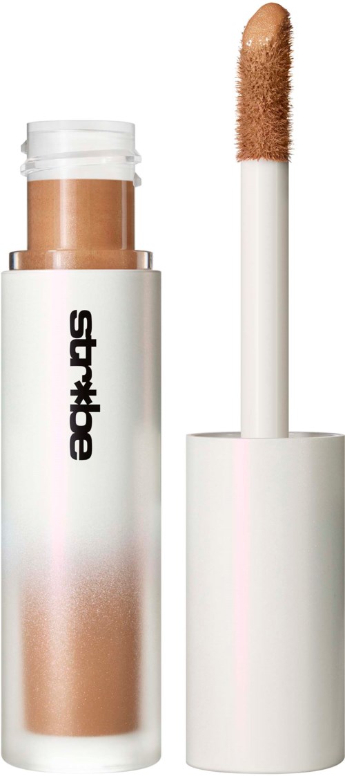 A stick of makeup with a light brown cover and a white base, labeled "SYLAX". The applicator wand is shown.