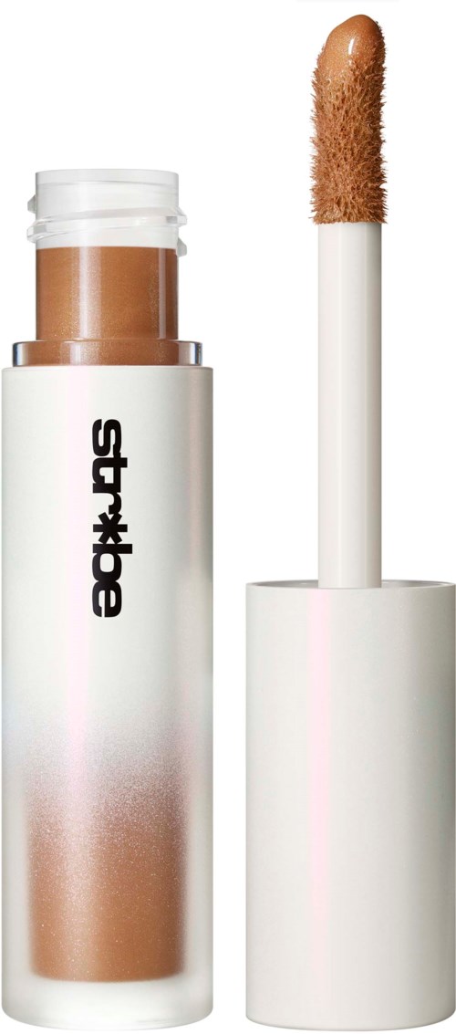A lip gloss with a brown shade inside and a white applicator with a brown tip.