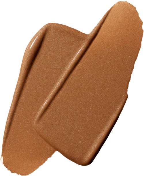A swatch of brown makeup or foundation cream with a smooth texture and curved shape.