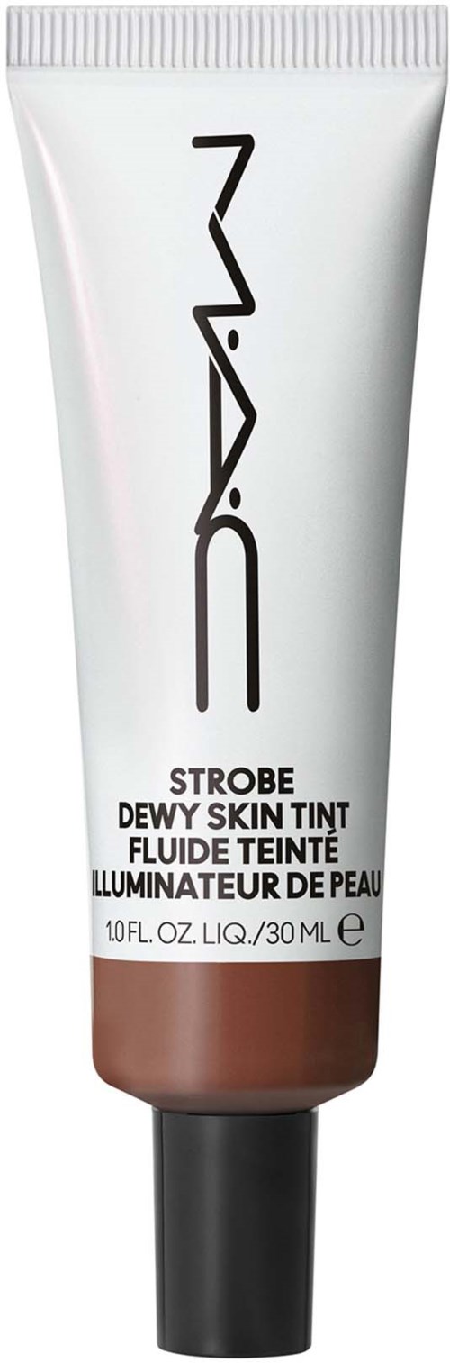 A tube of MAC Strobe Dewy Skin Tint with white and brown packaging and black cap.
