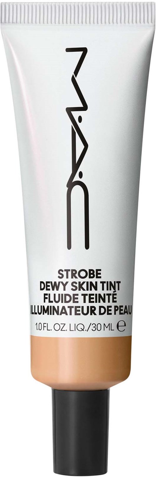 A white tube with a black cap, labeled MAC, and orange tone skin tint for face makeup.
