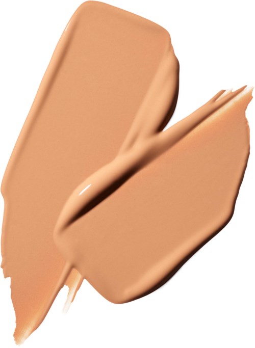 A beige liquid or cream spread with a thick texture on a white background.