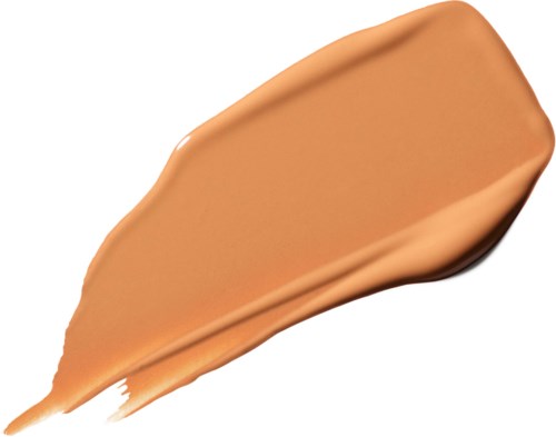 A smear of beige liquid makeup or foundation on a white background.
