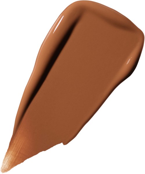A brown makeup foundation smear on a white background. It is smooth and creamy in texture.