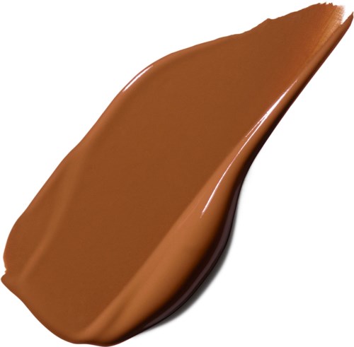 A dollop of brown creamy substance, smoothly spread, with a slight glossy shine.