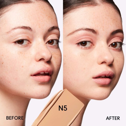 A woman shows clear skin improvement with makeup after using N5 product, side-by-side before and after photos.