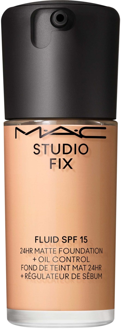 A foundation bottle labeled MAC Studio Fix, with SPF 15 and oil control, in a beige bottle with a black cap.