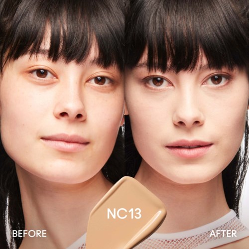 Two women with similar looks before and after using a skin care device, labeled NC13. One woman is smiling slightly.