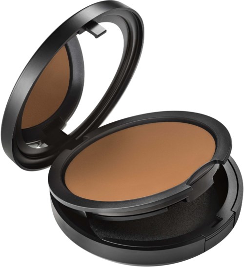 A compact makeup powder case with mirror, containing brown powder used for face makeup.
