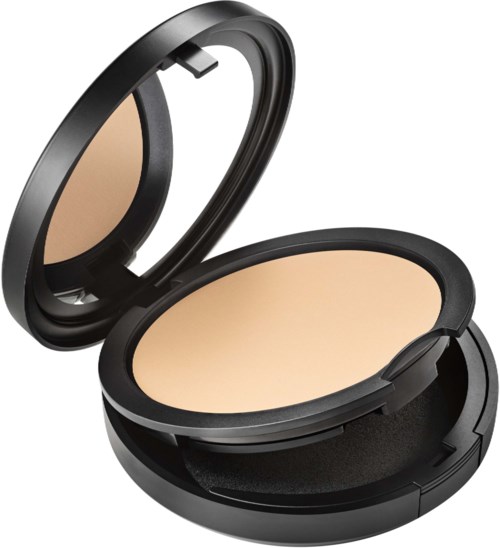 A compact makeup powder with a mirror, black case, and beige powder inside.