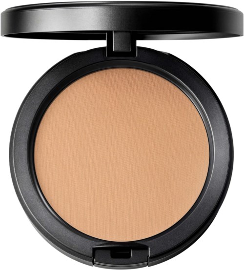 A compact round makeup powder container with a black lid, filled with beige powder.
