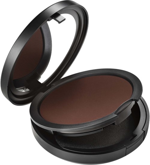 A compact makeup or face powder container with a mirror inside the lid, containing brown powder.