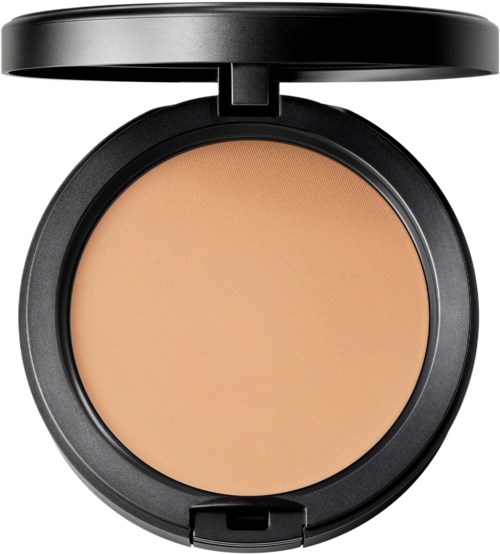 A compact black case with a beige pressed powder inside, and a closed lid on top.