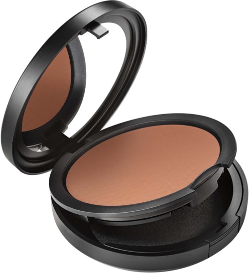 A compact makeup powder with a mirror inside its round black case.