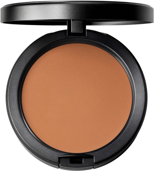 A black compact containing orange-brown powder, likely makeup or blush, with a flip cover.