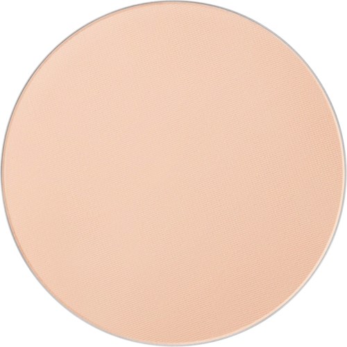 A round makeup compact with a peach-colored pressed powder inside.
