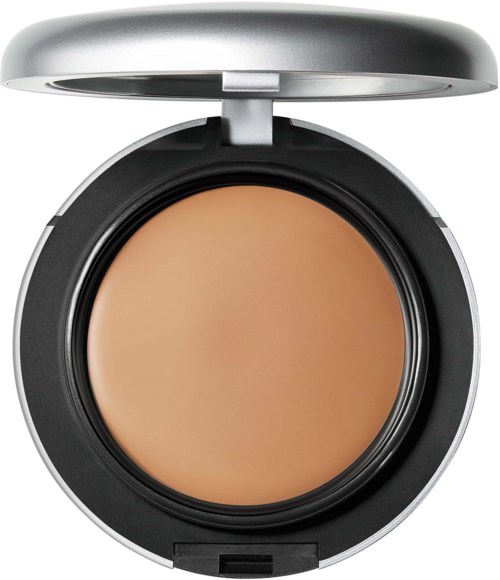 En rund kompaktil som inneholder beige ansiktspudder med åpen lokk, viser pudderet.
