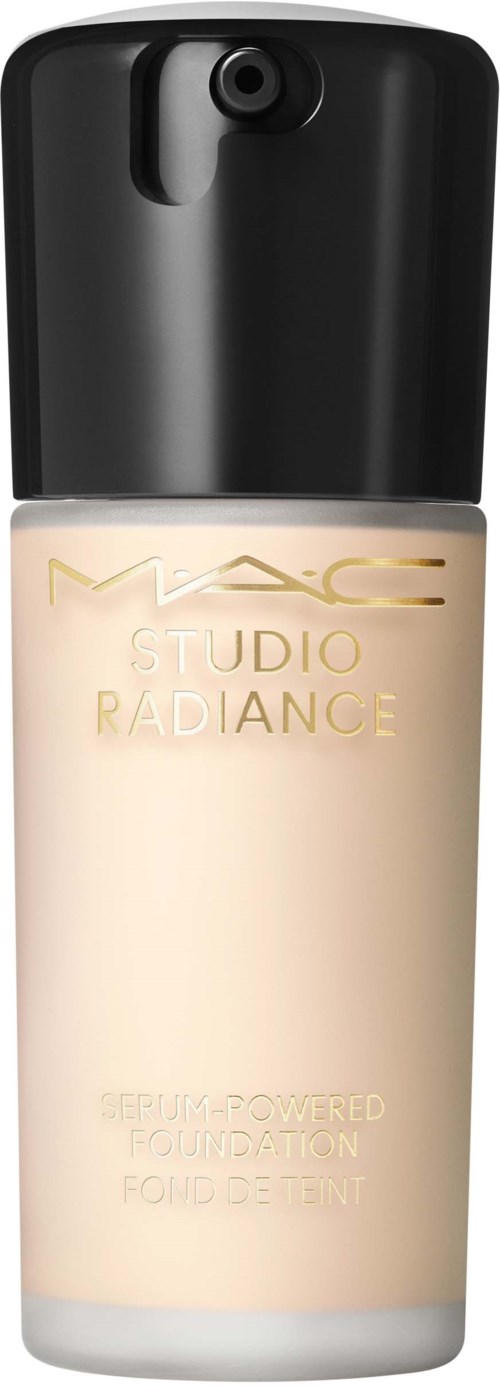 A bottle of MAC Studio Radiance foundation with a black cap and logo, mostly white and beige.