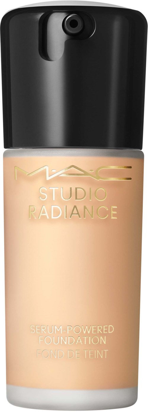A bottle of MAC Studio Radiance foundation with black cap and beige liquid inside.