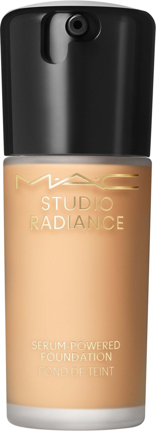 A bottle of MAC Studio Radiance serum-powered foundation, with a black cap and beige liquid inside.