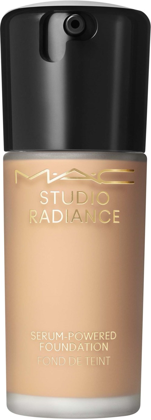 A beige bottle of MAC Studio Radiance serum-powered foundation with a black cap and spray nozzle.