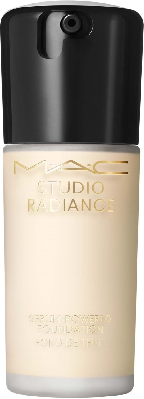 A foundation bottle with a black cap and golden text, labeled 'MAC Studio Radiance,' contains liquid makeup.