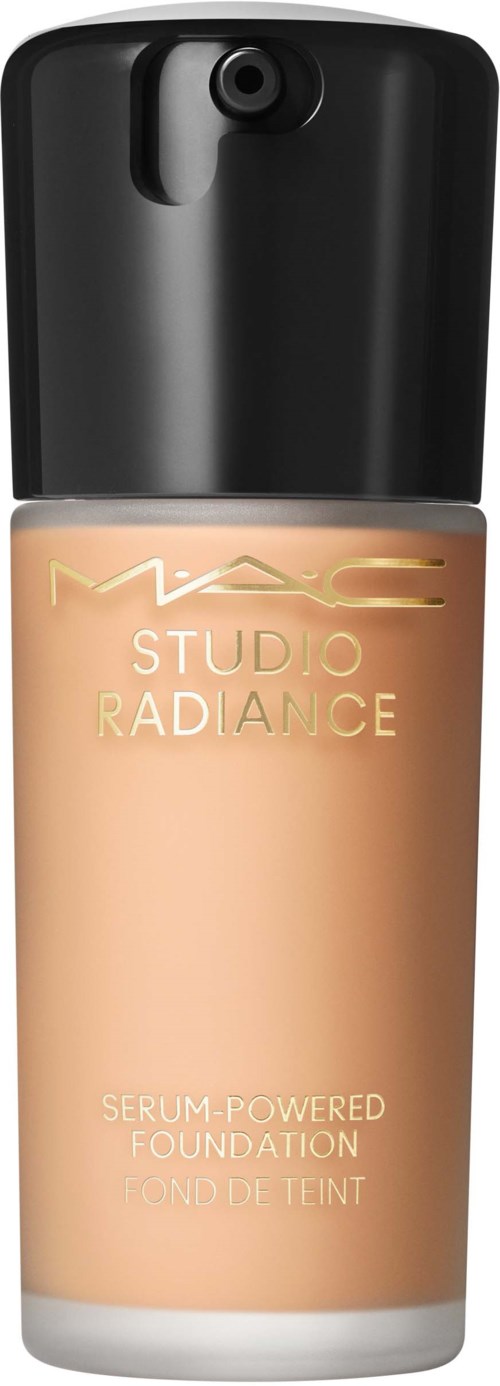 A bottle of MAC Studio Radiance foundation with a black cap and beige liquid inside.