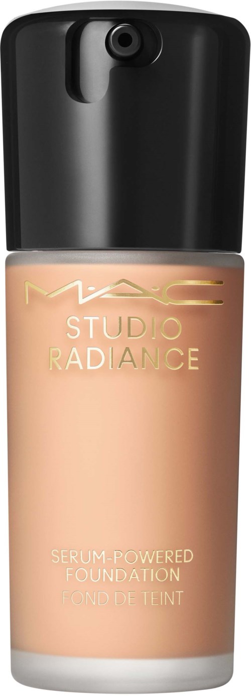 A bottle of MAC Studio Radiance foundation with a black cap and beige liquid inside.