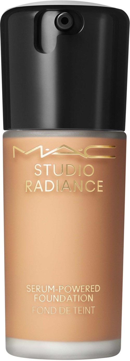 A bottle of MAC Studio Radiance serum foundation with a black cap. It is a liquid makeup product.