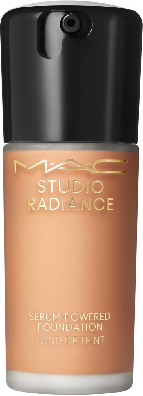 A bottle of MAC Studio Radiance serum-powered foundation, with a black cap and beige liquid inside.