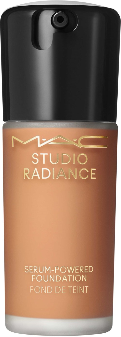 A bottle of MAC Studio Radiance serum-powered foundation with a black cap and beige liquid inside.