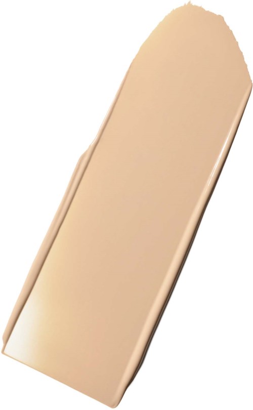 En beige foundationstav med jevn overflate og avrundede kanter.