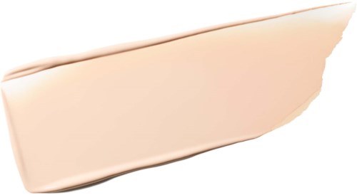 Swatch av lys beige foundation med jevn tekstur på hvit bakgrunn.