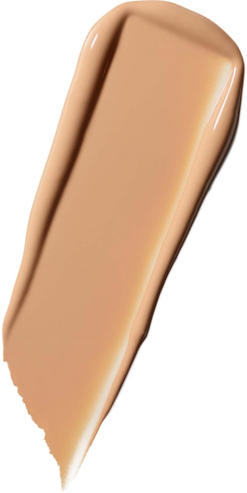 En beige flytende foundation i tube med en liten smøre nederst.