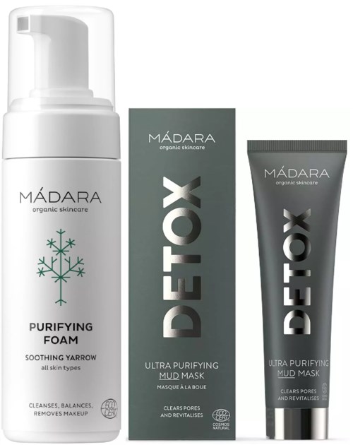 Drei Hautpflegeprodukte: Reinigungs-schaum, Detox-Schlammmaske in einer Schachtel, und eine Tube Detox-Schlammmasken.