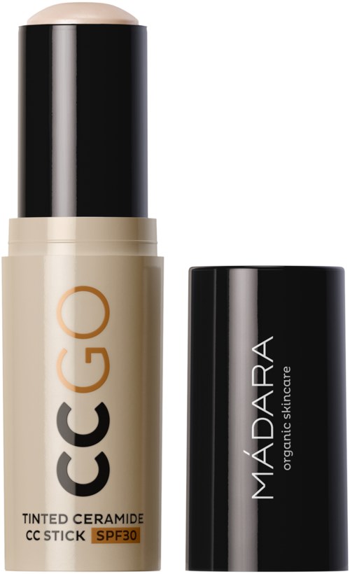 Een getinte keramische CC-stick met SPF 30 in zwart en beige verpakking van Madara.