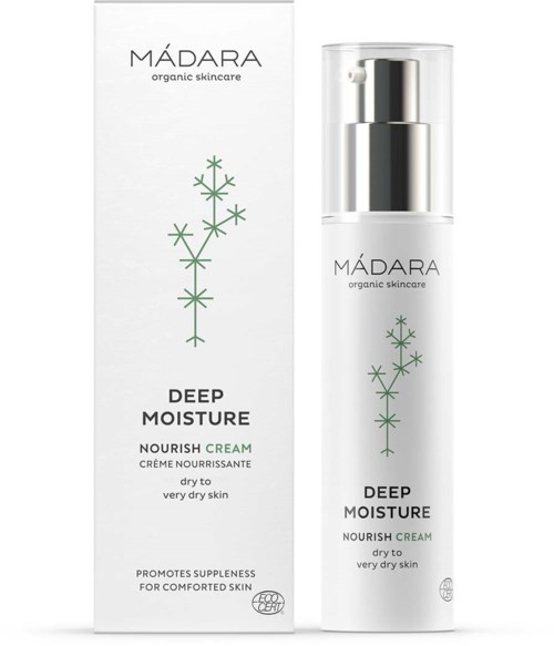 En vit förpackning och en pumpflaska med Madara Deep Moisture Nourish Cream för mycket torr hud. Enkel design med grönt växtmotiv.