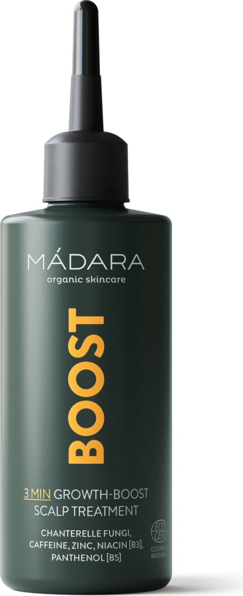A green bottle with a black spray tip labeled MÁDARA BOOST, for scalp treatment with natural ingredients.