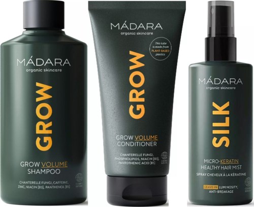 Three MÁDARA growth haircare products: shampoo, conditioner, and hair mist in green bottles with yellow text.