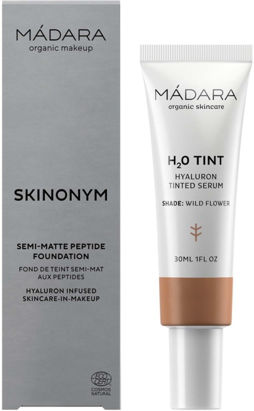Hautpflegeprodukt mit Packung und Tube. Die Verpackung zeigt die Marke MáDARA und Produktdetails. Das Tuben enthält getönten Serum.