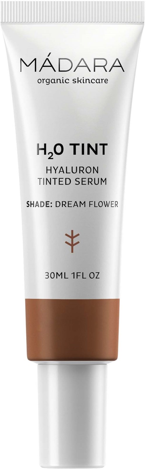 Eine weiße Tube mit braunem Boden, beschriftet mit 'MADARA organic skincare H2O TINT Tinted Serum' mit einem kleinen Blumenzeichen.